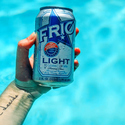 Enjoy FRIO Can in Hand and Over the Pool